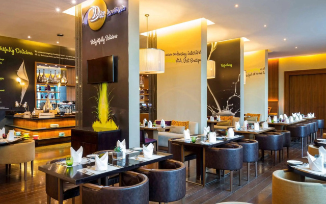 Отель Novotel Suites Mall Avenue Dubai
