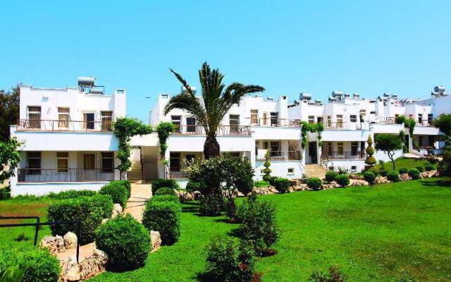 Dolunay Apartments Турция, Алтинкум - отзывы, цены и фото номеров - забронировать отель Dolunay Apartments онлайн вид на фасад