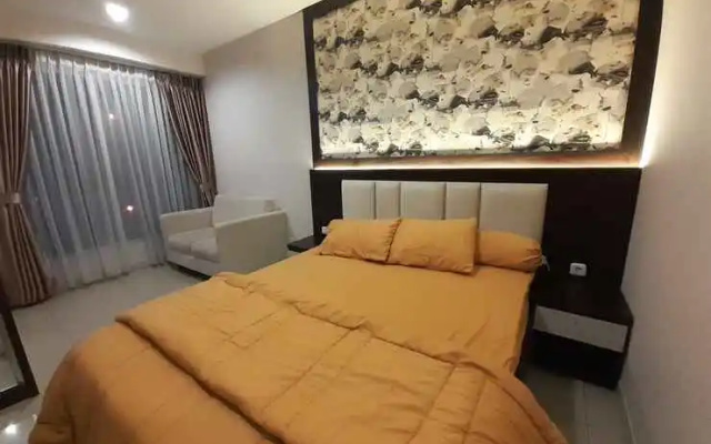 Apartemen Grand Kamala Lagoon Cozy by Lotus Property