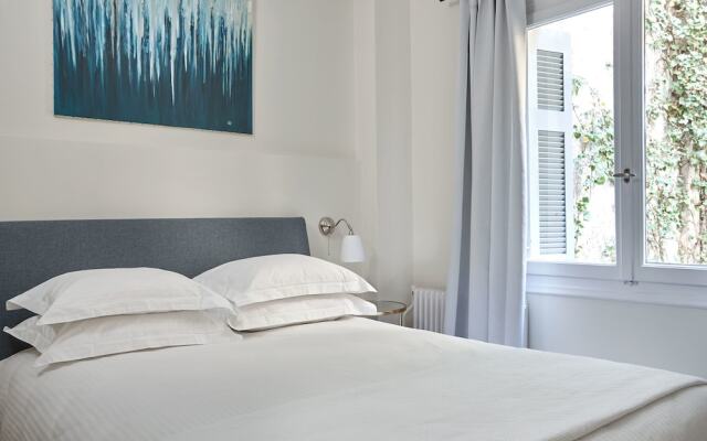 Апартаменты Kolonaki square Apartment Афины комната для гостей