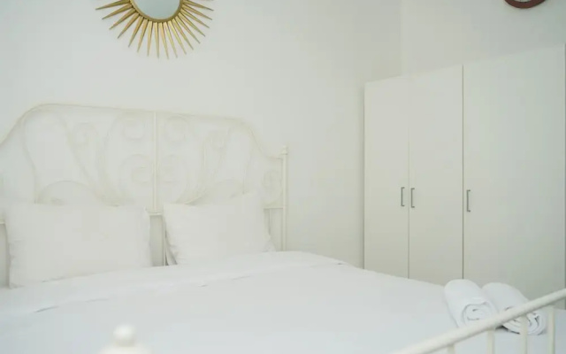 Strategic And Homey 2Br At Puri Garden Apartment Near Mall