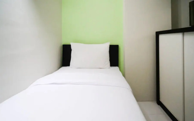 Simple And Homey 2Br At Dian Regency Apartment