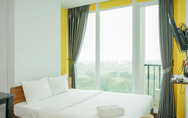 Homey Studio Room at Tree Park Apartment