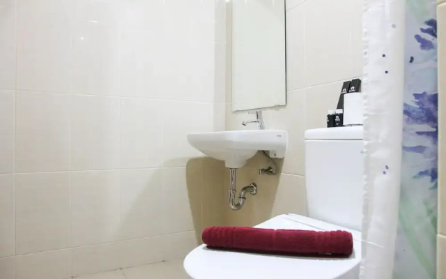 Homey Studio at the Oasis Cikarang Apartment by Travelio