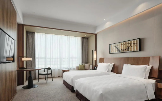 HUALUXE Ningbo Harbor City by IHG