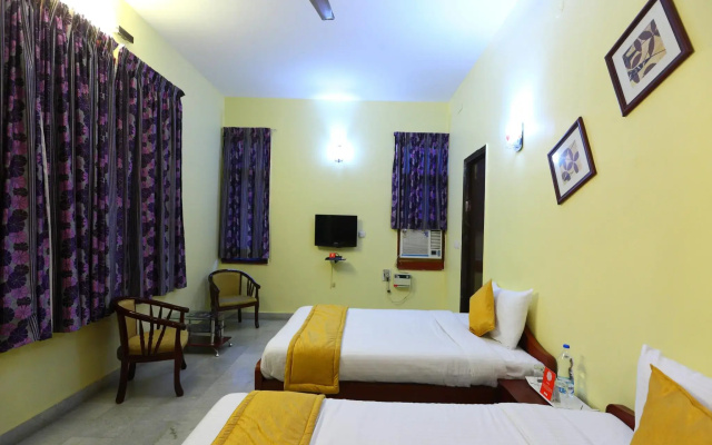 Golden Flowers Inn - Ekkatuthangal