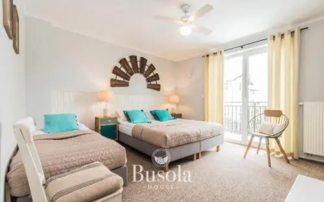 Busola House