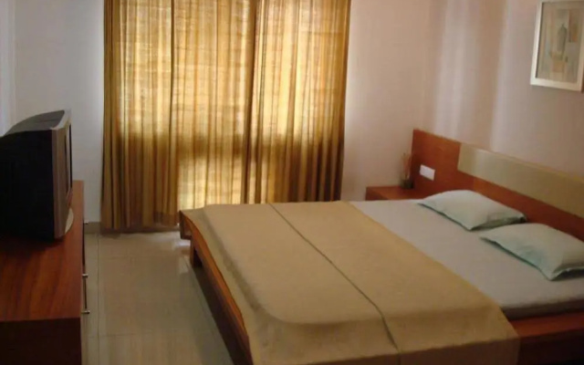 Kalpatharuvu Service Apartment