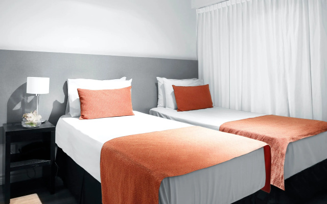 Reco by DOT Suites