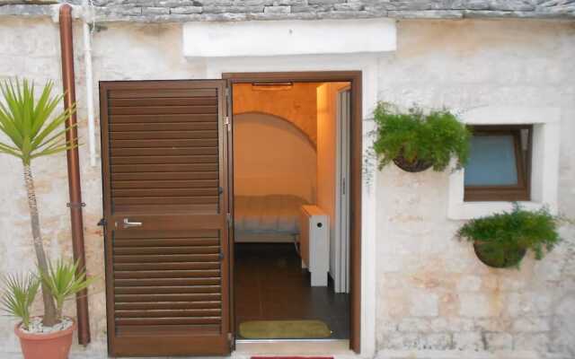 Отель Trulli Casa Alberobello Альберобелло вид на фасад