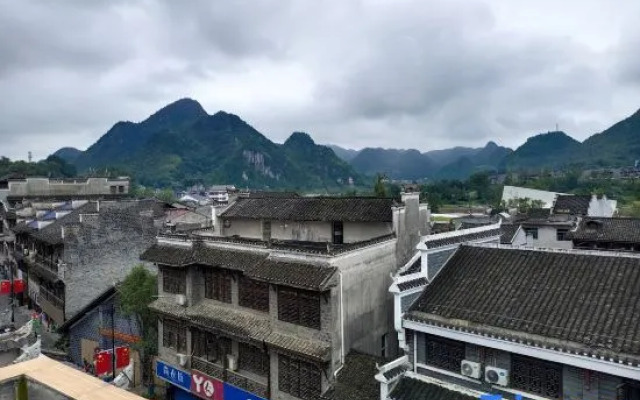 Huaxi Wanjia Homestay