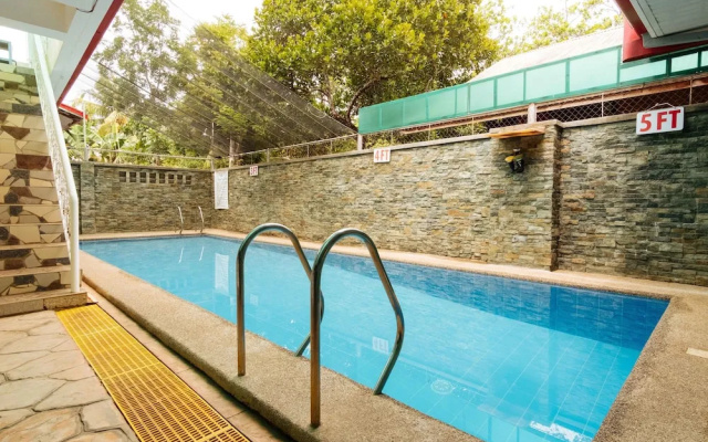 Reddoorz Premium Near Pristine Beach