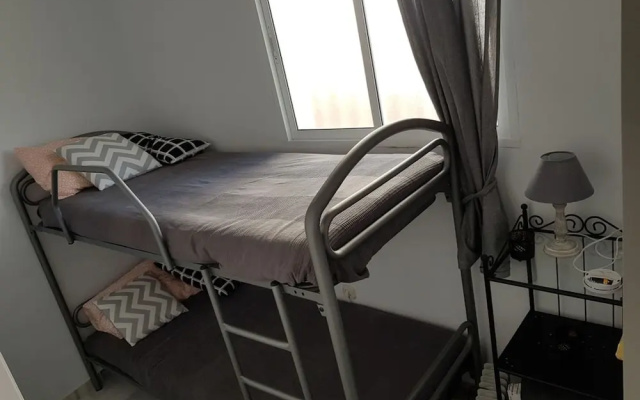 Sunny and spacious apartment with own entrance to pool