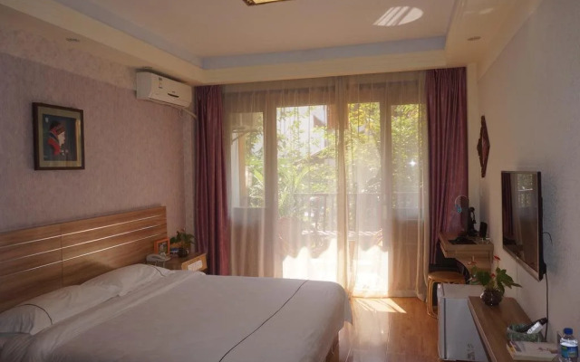 Xishuangbanna Shibao Business Hotel