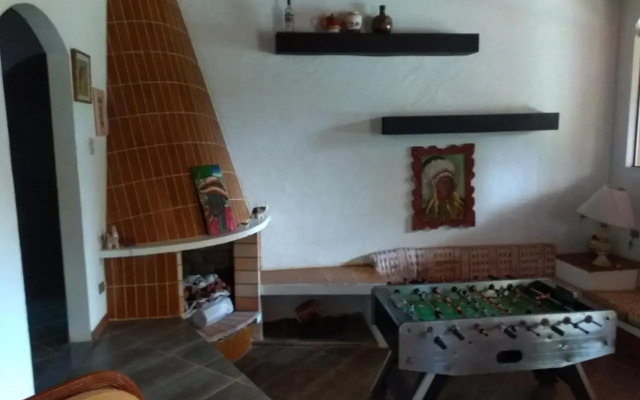 Casa com piscina em condomínio fechado no Guarujá