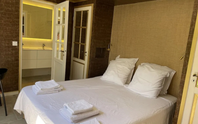 Chambre Luxe Piscine Jardin vue Solarium Palmeraie
