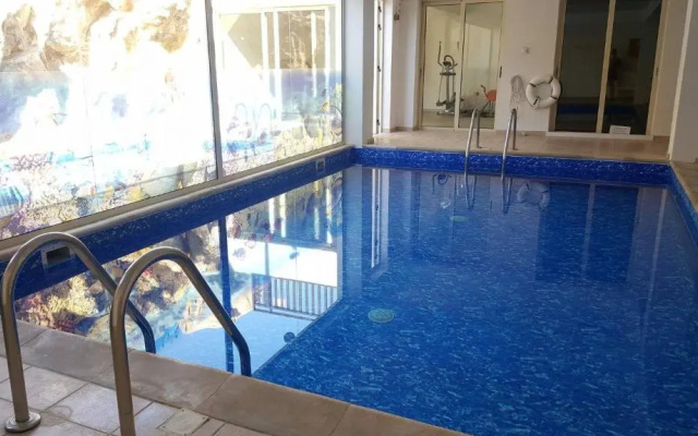 Stunning apartment C106 with balcony looking over pool