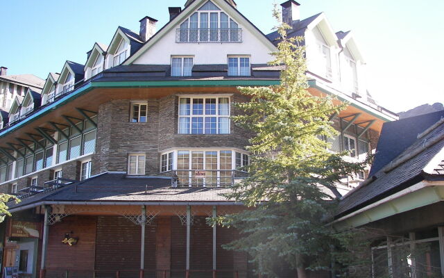 Отель Apartamentos Todosierranevada Zona Baja вид на фасад