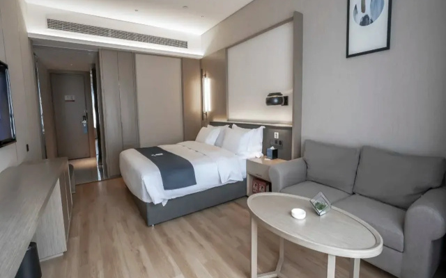 Echarm Hotel (Leibo tourism passenger transport center station)