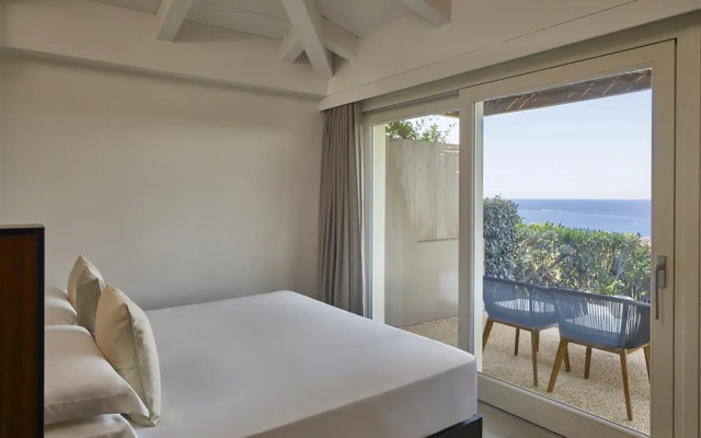 Baia di Chia Resort Sardinia, Curio Collection by Hilton
