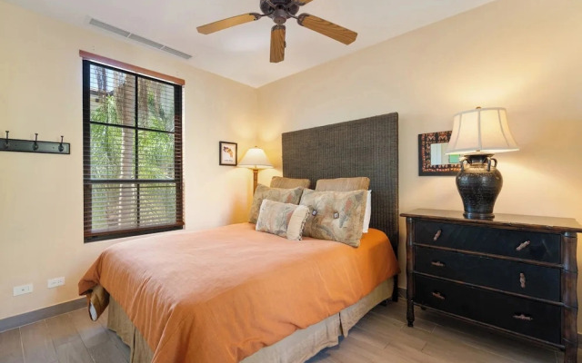 Luxe! Impressively designed 2nd-floor unit in Coco done in red and orange hues