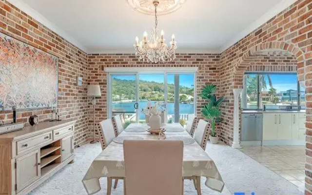 Stunning 4BR Holiday Home with Water Views & Pool