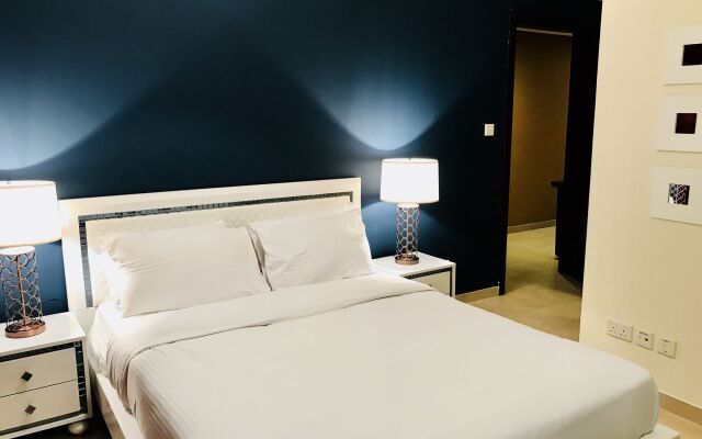 Отель Yanjoon Holiday Homes - Marina Tower комната для гостей