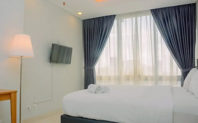 Comfy and Spacious 2BR The Masterpiece Epicentrum Apartment By Travelio