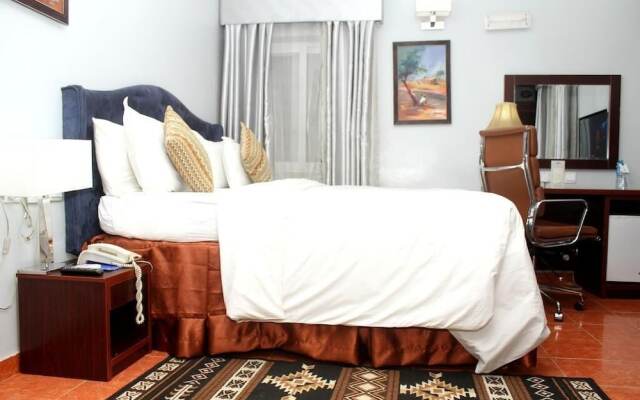 Отель Hoil Suites Калабар комната для гостей