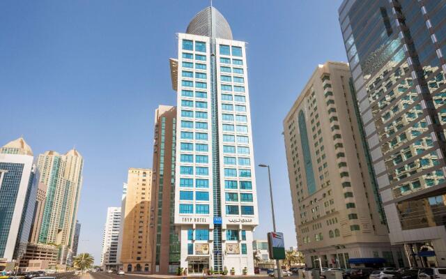 Отель TRYP by Wyndham Abu Dhabi City Centre вид на фасад