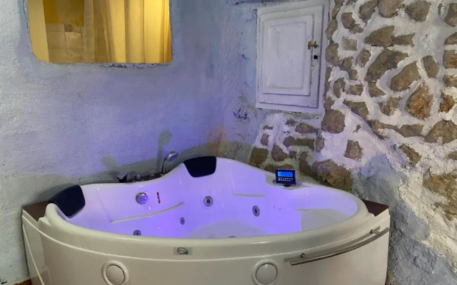 La Olivera APARTHotel Rural Suites bañera hidro o Jacuzzi privados