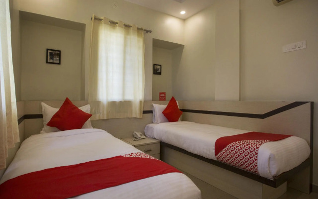 OYO 11566 Shree Swami Apartment
