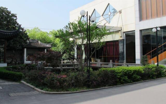 Glamor Hotel Suzhou вид на фасад