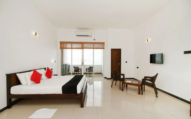 Capital O 311 Grace Beach Resort