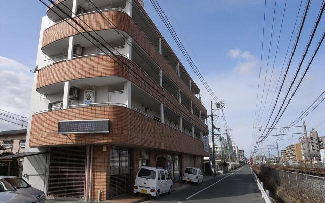 Отель Maison Sanwa By Weekly Inn Тосу вид на фасад