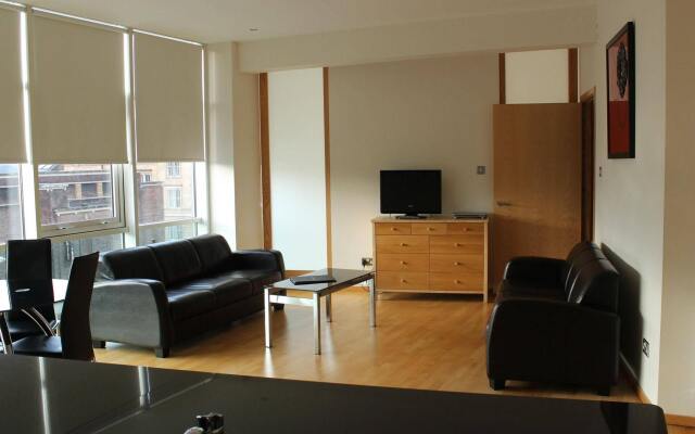 Отель Glasgow Lofts комната для гостей