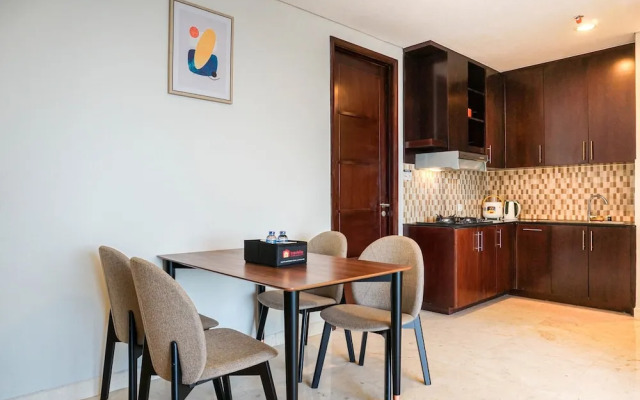 Cozy 2BR at Empyreal Epicentrum Apartment By Travelio