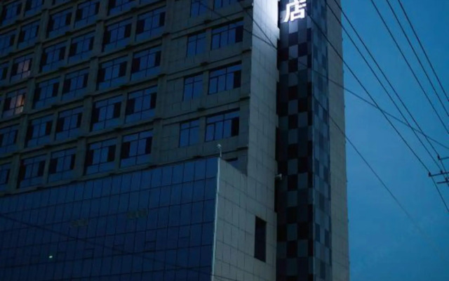 Elong Migao Fashion Hotel (Fei County New Bus Station)
