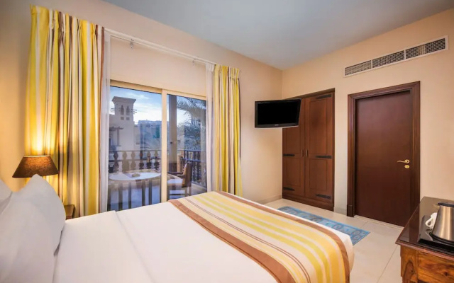 Отель Al Hamra Residence & Village