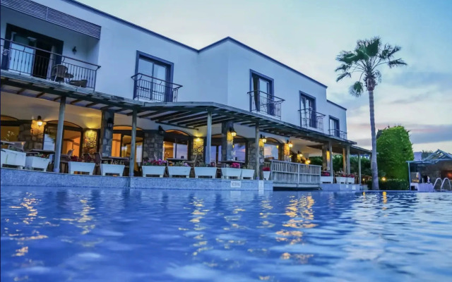 Курортный отель Mira Beach Resort Bodrum - All inclusive