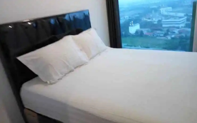 Alpine Room at TreePark City Apartemen