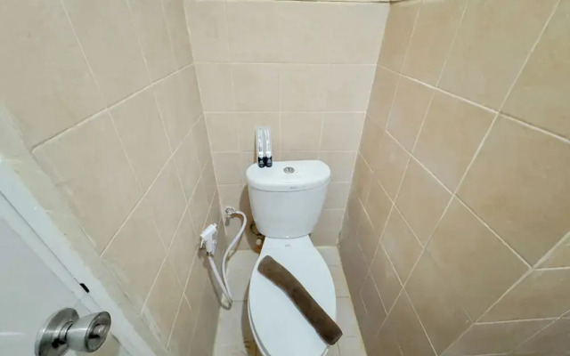 Compact and Restful 2BR at Menara Rungkut Apartment