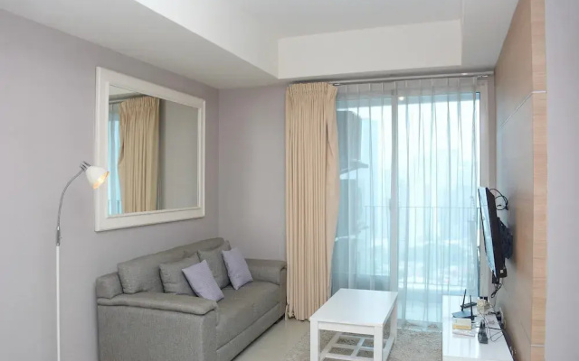 Homey And Cozy Stay 2Br At Casa Grande Apartment