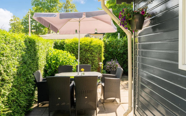 Lovely Wooden Chalet With Garden in Reutum