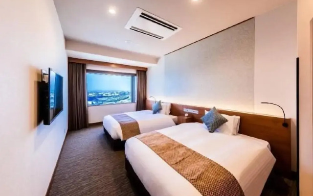 Odysis Suites Osaka Airport Hotel