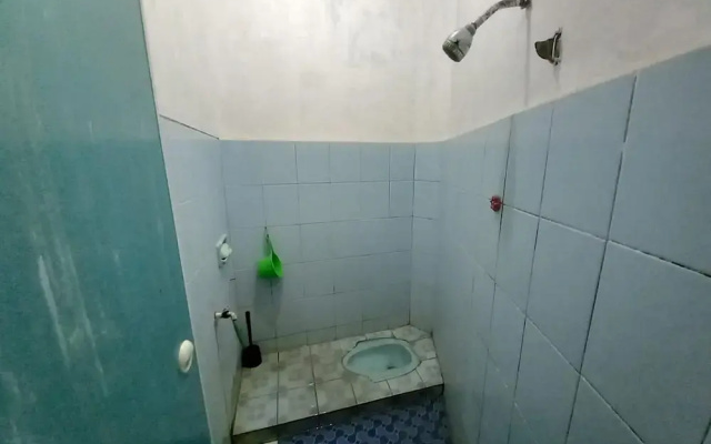 OYO 95096 Dewi Sudirman Guest House