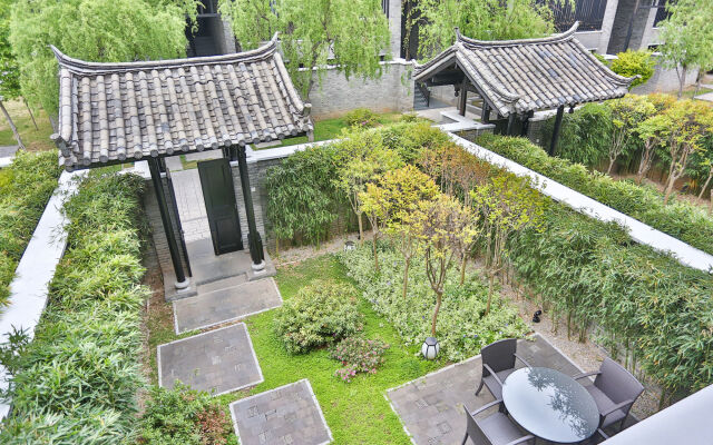 Отель Banyan Tree Lijiang