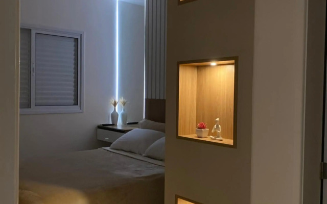 Apartamento em Bertioga com varanda gourmet