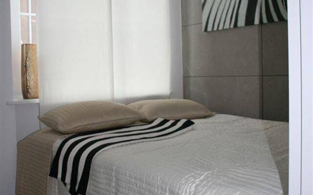 Отель Apartament Szeroka комната для гостей