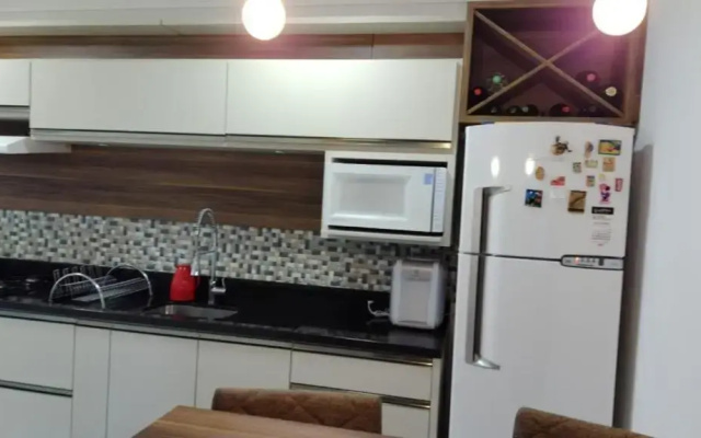 Apto a uma quadra do mar em torres